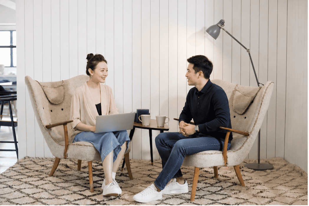 A coach and client discussing a major life transitions during a life coaching session.