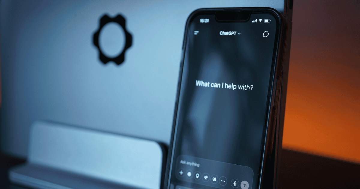 Person using an AI app on their phone late at night