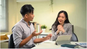 Career development coach in conversation with a client during a coaching session